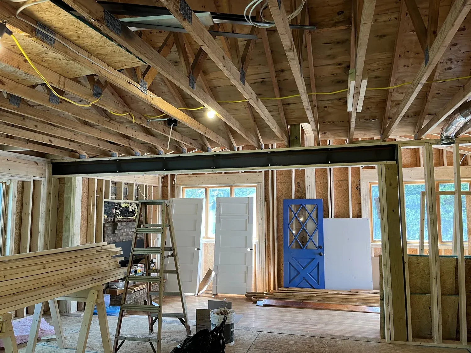 Interior framing with steel support beam during renovation